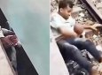 Ребенок упал под поезд: отец бросился за ним и спас (ВИДЕО)