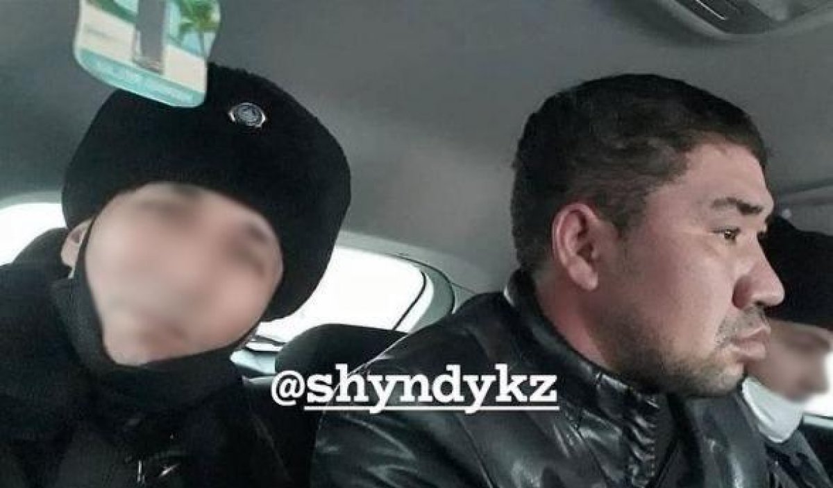 Шымкентского полицейского могут наказать из-за селфи с насильником