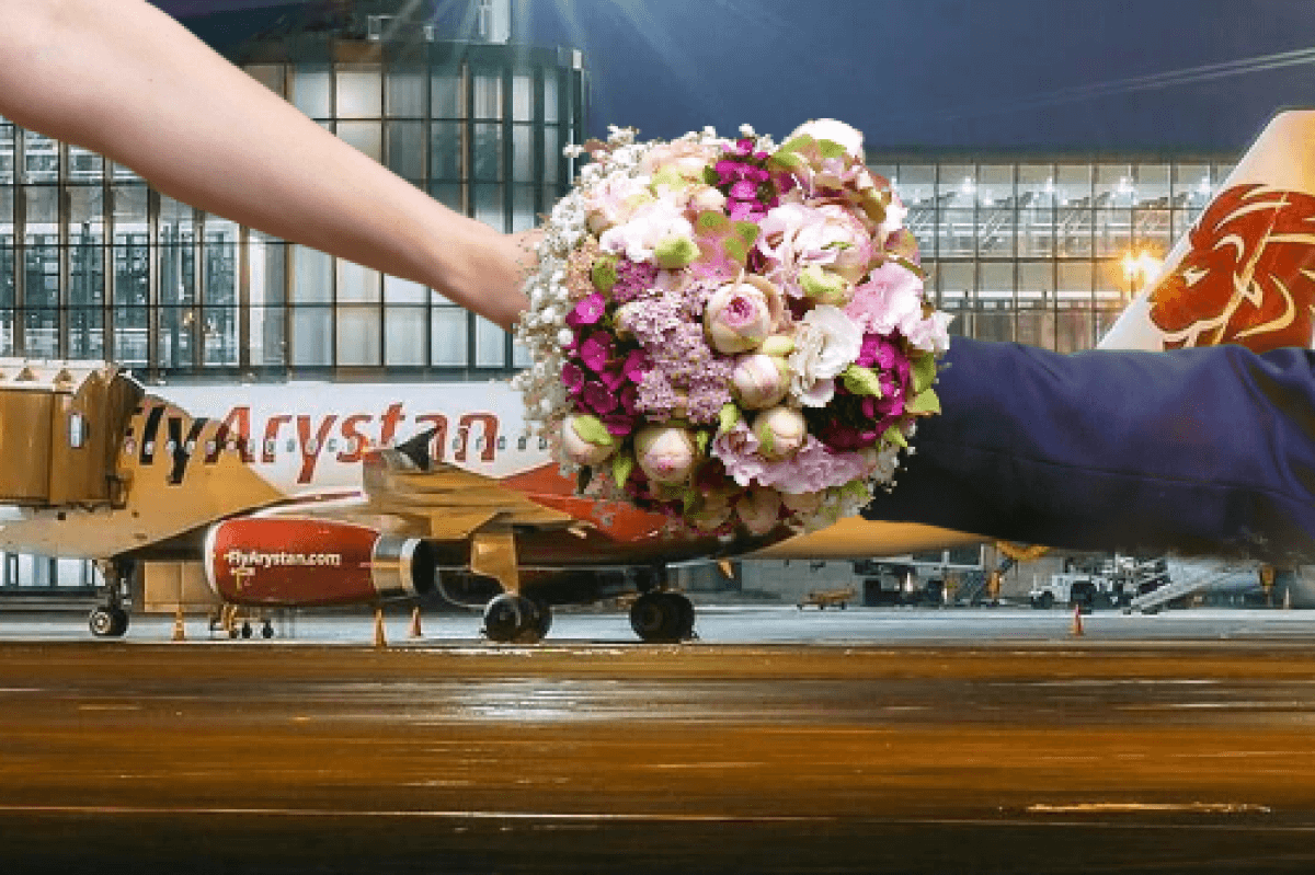 FlyArystan не позволила пассажирке взять букет на борт