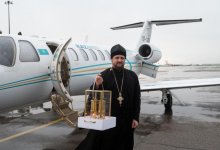 Благодатный огонь из Иерусалима доставили в Казахстан