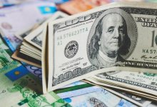 Доллар опустился ниже 414 тенге на торгах 25 мая