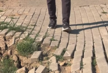 “Метеоритный кратер” на тротуаре: активисты инспектируют пешеходную инфраструктуру Астаны