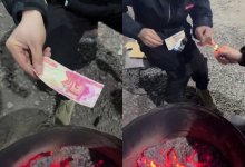 Иностранцев, прикуривших от узбекской купюры, наказали в Ташкенте