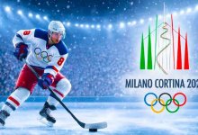 Шайба на олимпийском хоккейном торте